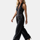Dara | Jumpsuit s halter výstřihem, zipem a kontrastním stehem