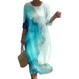 Marvella – Elegantní midi šaty s uměleckým potiskem